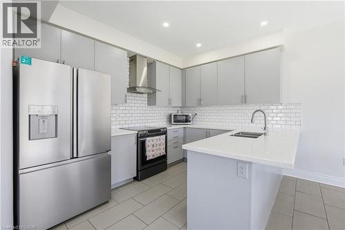 57 Thompson Road, Caledonia, ON - Indoor Photo Showing Kitchen With Double Sink With Upgraded Kitchen