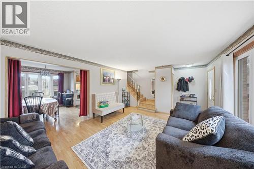 Bright living area with wood-finish flooring - 116 Gainsborough Road, Hamilton, ON - Indoor Photo Showing Living Room