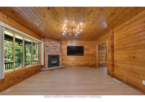 2668 Mcdonald Road, Springwater, ON - Indoor With Fireplace