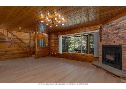 2668 Mcdonald Road, Springwater, ON - Indoor With Fireplace