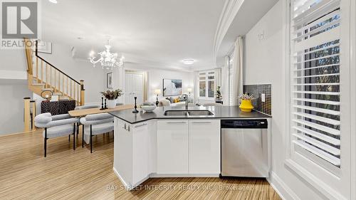 Th36 - 9 Oakburn Crescent, Toronto, ON - Indoor Photo Showing Kitchen With Double Sink
