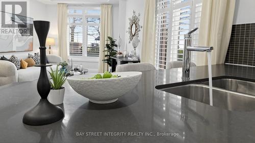 Th36 - 9 Oakburn Crescent, Toronto, ON - Indoor Photo Showing Kitchen With Double Sink