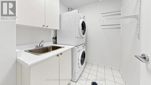 Th36 - 9 Oakburn Crescent, Toronto, ON - Indoor Photo Showing Laundry Room