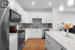 Newer kitchen with nice backsplash - 
