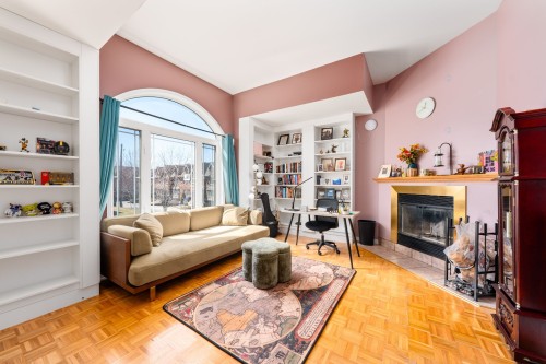 Bibliothèque - 259 Rue Mirabel, Dollard-Des-Ormeaux, QC - Indoor Photo Showing Living Room With Fireplace