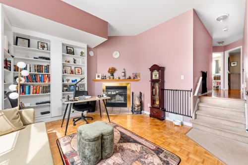 Bibliothèque - 259 Rue Mirabel, Dollard-Des-Ormeaux, QC - Indoor With Fireplace