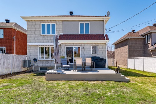 Face arrière - 259 Rue Mirabel, Dollard-Des-Ormeaux, QC - Outdoor With Deck Patio Veranda With Exterior