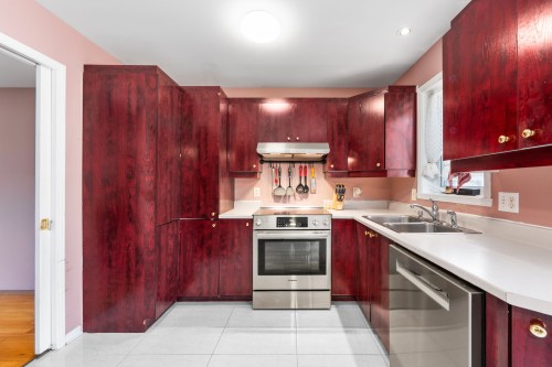 Cuisine - 259 Rue Mirabel, Dollard-Des-Ormeaux, QC - Indoor Photo Showing Kitchen With Double Sink