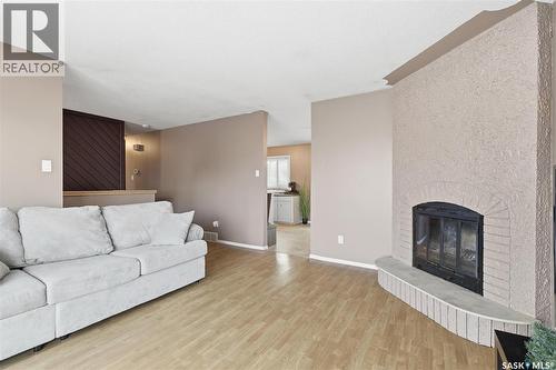 3312 Grant Road, Regina, SK - Indoor Photo Showing Living Room With Fireplace