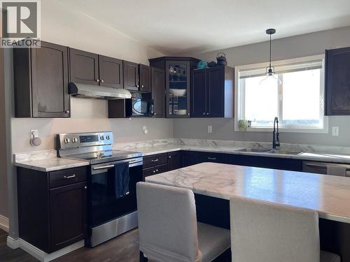 5212 Hallmark Crescent, Fort Nelson, BC - Indoor Photo Showing Kitchen