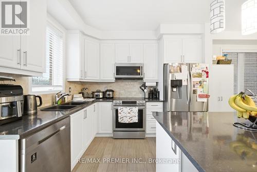 931 Penson Crescent, Milton, ON - Indoor Photo Showing Kitchen With Double Sink