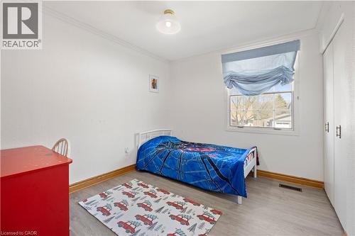 Bright room featuring light wood-finish flooring and white walls - 277 Blackacres Boulevard, London, ON - Indoor Photo Showing Bedroom