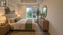 Virtually Staged - 210B - 16 Melbourne Avenue, St. Catharines, ON  - Indoor Photo Showing Bedroom 