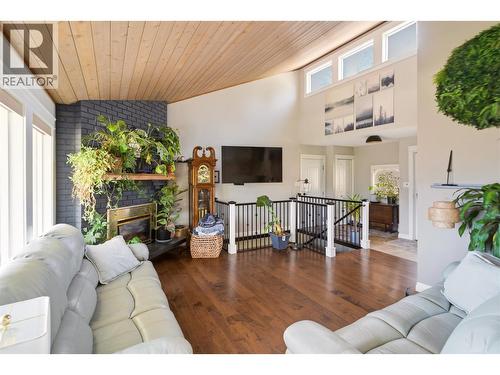 300 Scenic Drive, Coldstream, BC - Indoor Photo Showing Living Room With Fireplace