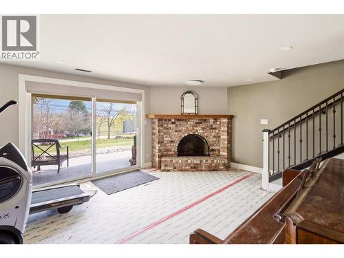 300 Scenic Drive, Coldstream, BC - Indoor Photo Showing Living Room With Fireplace