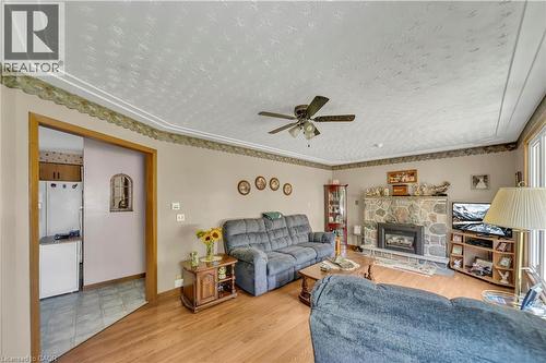 5427 Perth Road 178, North Perth, ON - Indoor Photo Showing Living Room With Fireplace