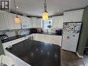739 Hudson Crescent, Hudson Bay, SK  - Indoor Photo Showing Kitchen With Double Sink 