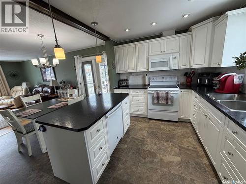 739 Hudson Crescent, Hudson Bay, SK - Indoor Photo Showing Kitchen With Double Sink