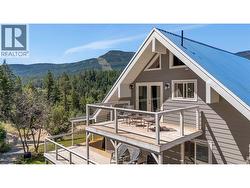 Cute deck off the vaulted primary suite. - 