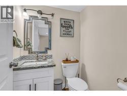 Powder room off the main entrance/dining room area. - 