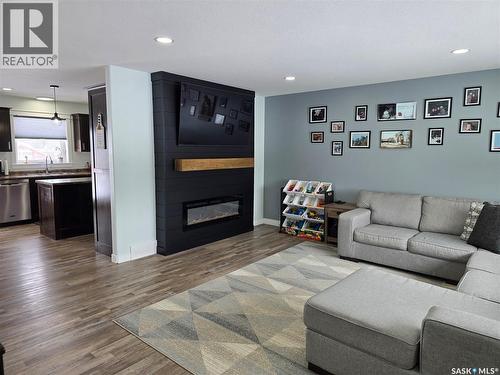 12 Scott Bay, Muenster, SK - Indoor Photo Showing Living Room With Fireplace