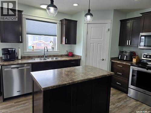 12 Scott Bay, Muenster, SK - Indoor Photo Showing Kitchen With Stainless Steel Kitchen With Double Sink