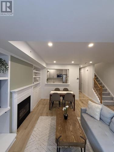 123 - 3 Everson Drive, Toronto, ON - Indoor Photo Showing Other Room With Fireplace