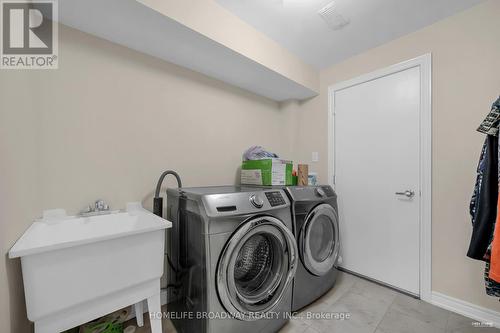 Washer/Dryer basement - 28 Paper Mills Crescent, Richmond Hill, ON - Indoor Photo Showing Laundry Room