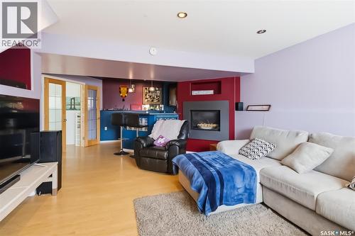 206 Brooklyn Crescent, Warman, SK - Indoor Photo Showing Living Room With Fireplace