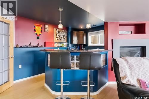 206 Brooklyn Crescent, Warman, SK - Indoor Photo Showing Other Room With Fireplace