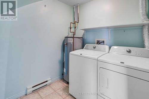 Laundry / HWT / Elect panel - 16 Pendleton Street, Champlain, ON - Indoor Photo Showing Laundry Room