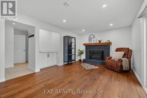 312 Faraday Court, Waterloo, ON - Indoor Photo Showing Other Room With Fireplace