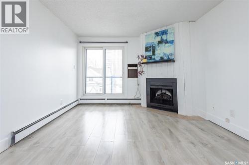 307 512 4Th Avenue N, Saskatoon, SK - Indoor With Fireplace