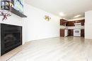 307 512 4Th Avenue N, Saskatoon, SK  - Indoor With Fireplace 