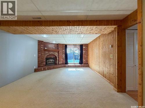 117 2Nd Street W, Frontier, SK - Indoor Photo Showing Other Room With Fireplace