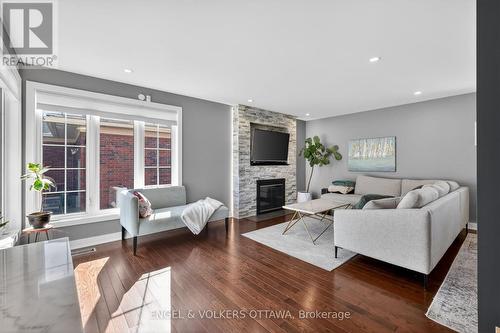 754 Cork Street, Ottawa, ON - Indoor Photo Showing Living Room With Fireplace