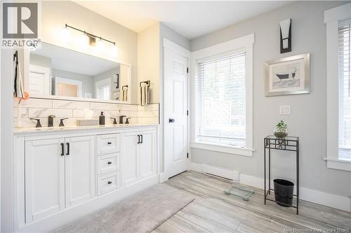 Semi-ensuite links hall and primary bedroom - 8 Dane Row, Willow Grove, NB - Indoor Photo Showing Bathroom