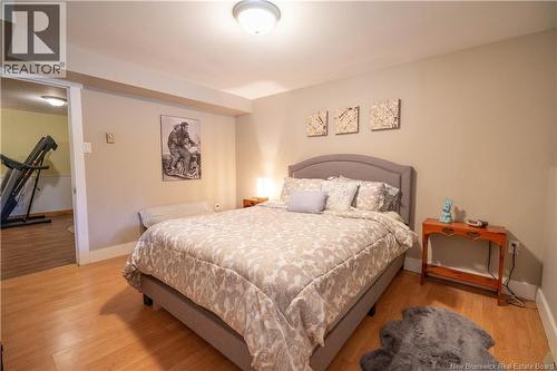 One of two lower level bedrooms - 8 Dane Row, Willow Grove, NB - Indoor Photo Showing Bedroom
