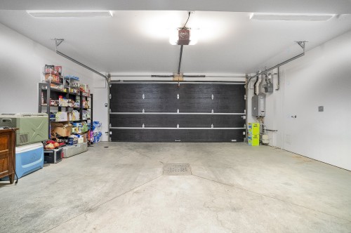 Garage - 24 Av. Des Chênes, Candiac, QC - Indoor Photo Showing Garage