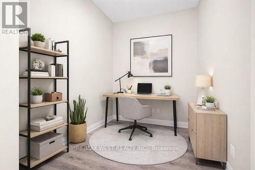 Virtually Staged Den - 615 - 16 Concord Place, Grimsby, ON - Indoor Photo Showing Office