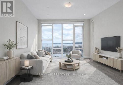Virtually Staged Living Area - 615 - 16 Concord Place, Grimsby, ON - Indoor Photo Showing Living Room