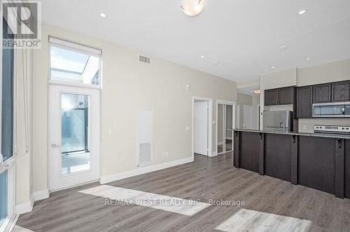Living Area/Kitchen - 615 - 16 Concord Place, Grimsby, ON - Indoor Photo Showing Kitchen