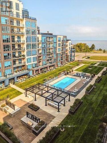 Terrific Courtyard And Pool Are - 615 - 16 Concord Place, Grimsby, ON - Outdoor With In Ground Pool