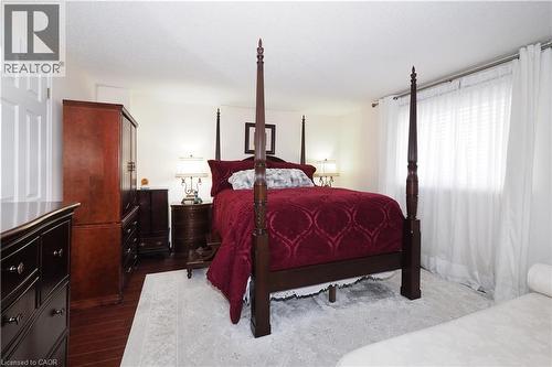 Bedroom with dark wood-style flooring - 89 Lynnhaven Court, Kitchener, ON - Indoor Photo Showing Bedroom