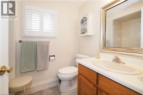 Full bath with vanity, light tile patterned flooring, and a shower - 89 Lynnhaven Court, Kitchener, ON - Indoor Photo Showing Bathroom
