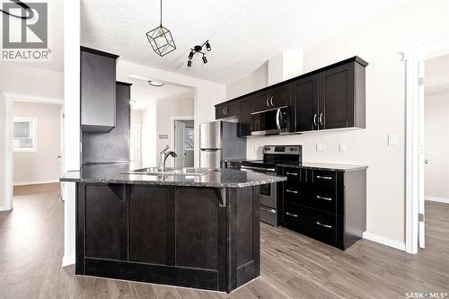 401 3826 Dewdney Avenue E, Regina, SK - Indoor Photo Showing Kitchen With Upgraded Kitchen