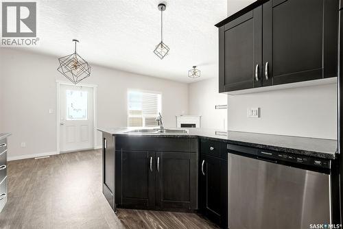 401 3826 Dewdney Avenue E, Regina, SK - Indoor Photo Showing Kitchen With Double Sink