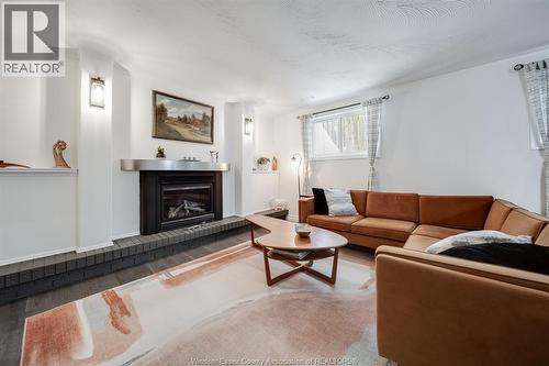 109 Centennial, Tecumseh, ON - Indoor Photo Showing Living Room With Fireplace