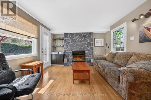 774 Manitou Drive, Ottawa, ON - Indoor Photo Showing Living Room With Fireplace