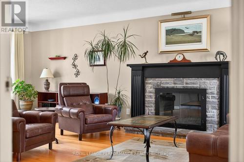774 Manitou Drive, Ottawa, ON - Indoor Photo Showing Living Room With Fireplace